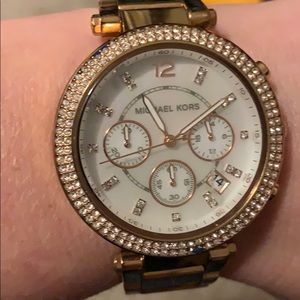 Rose gold Michael Kors watch.